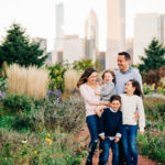 Chicago family photographer - chicago family smiles together with skyline